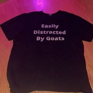 Selling a large comedy shirt. From the brand Gildan.